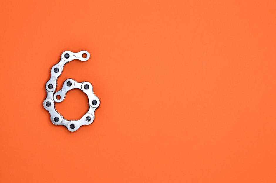 Metal chain in the shape of number 6 representing linked services