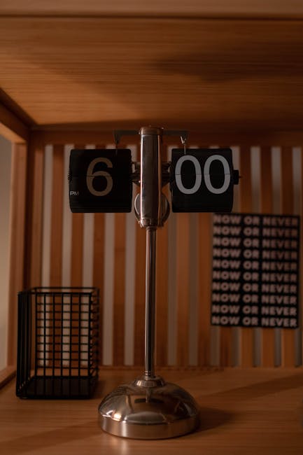 Flip clock showing 6:00 representing precision and timing in banking