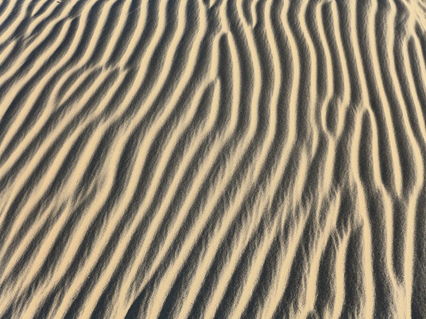 Sand ripples pattern representing market fluctuations and trends